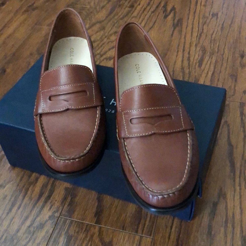 Cole Haan tan penny loafers